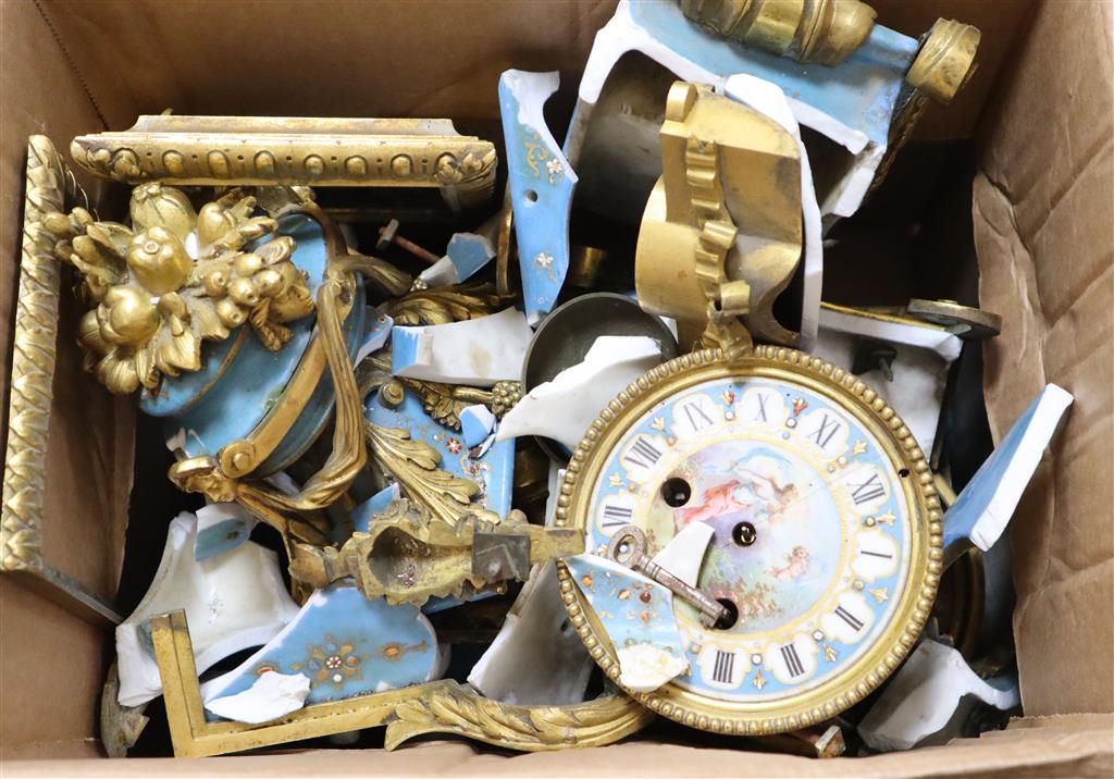 A French porcelain and ormolu clock (for restoration)